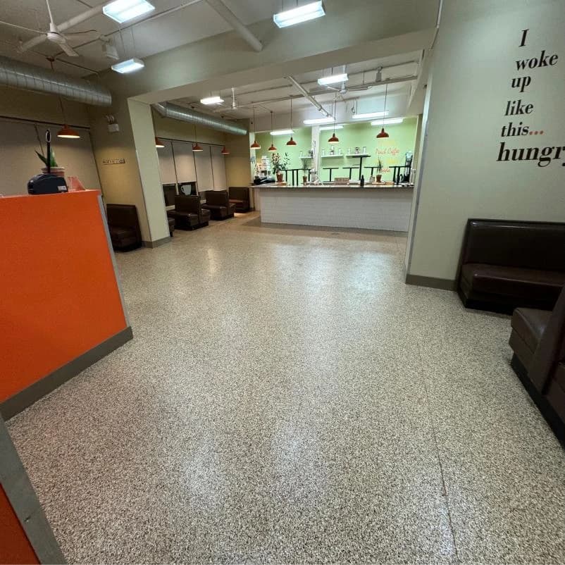 Restaurant dining area with a light flake floor coating